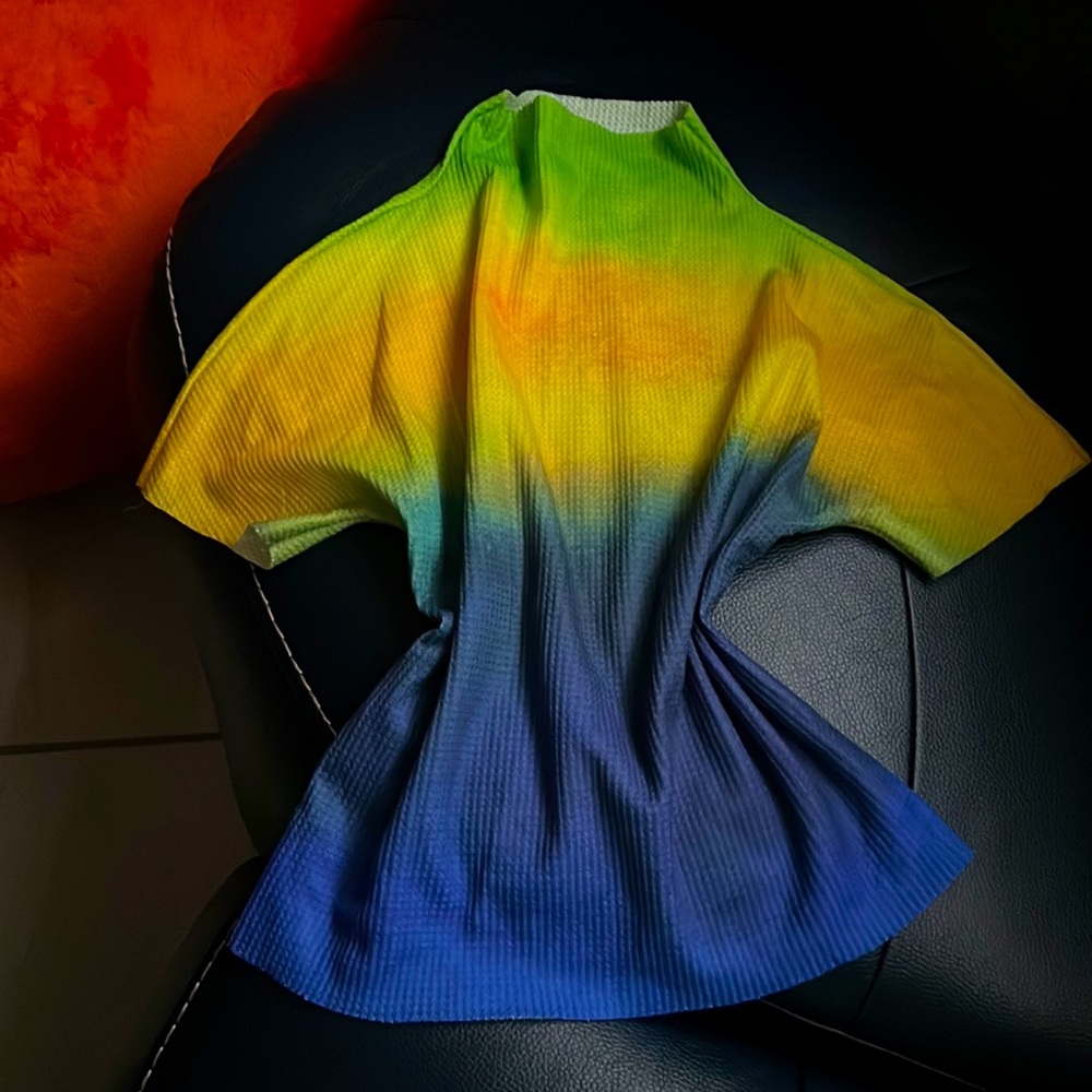 Turtle neck vibrant green, yellow, and blue.